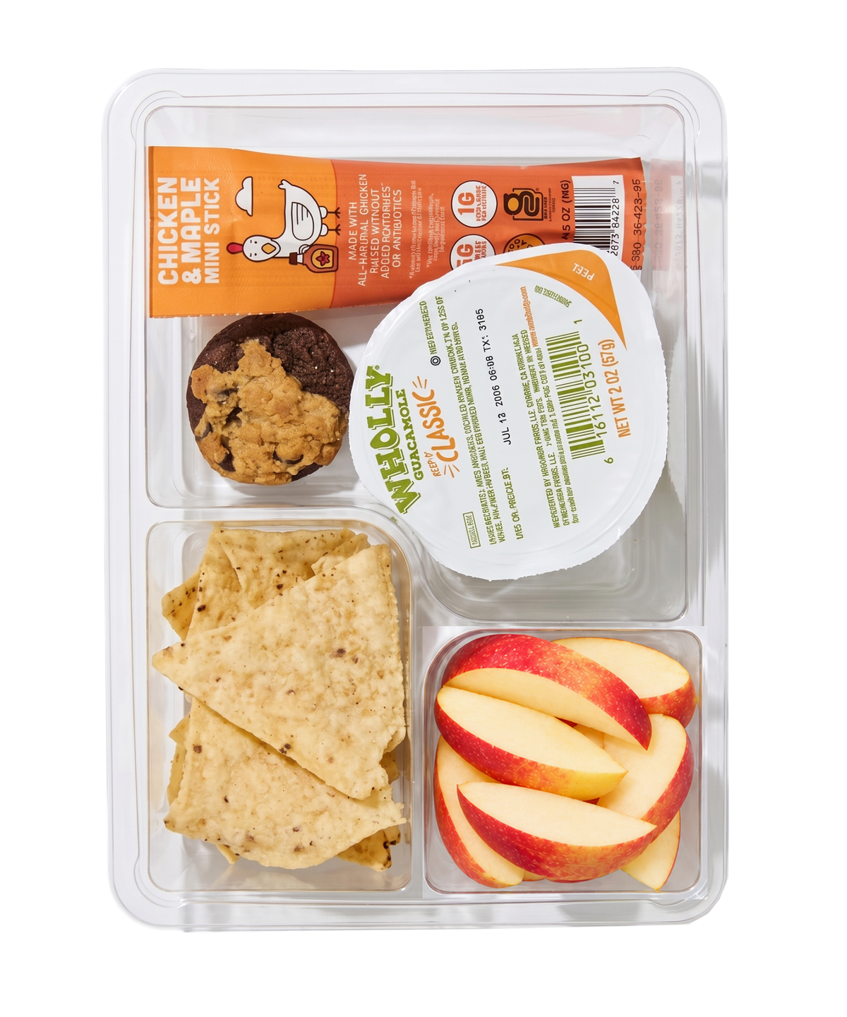 Grab-and-go Snack or lunch bento box kit - like a healthy lunchable - with tortilla chips, guacamole, apple slices, brookie bite and a chicken maple jerky stick, made gluten-free, nut-free and top-9-allergen-free